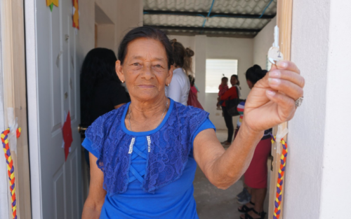 FUNDASAL Woman Holding Key